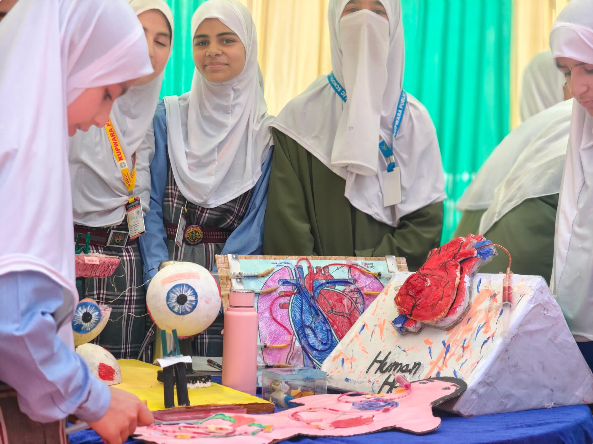 Students presenting science exhibition projects